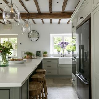 green shaker style farmhouse kitchen