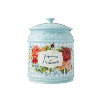 A blue cookie jar that says 'happiness is homemade'