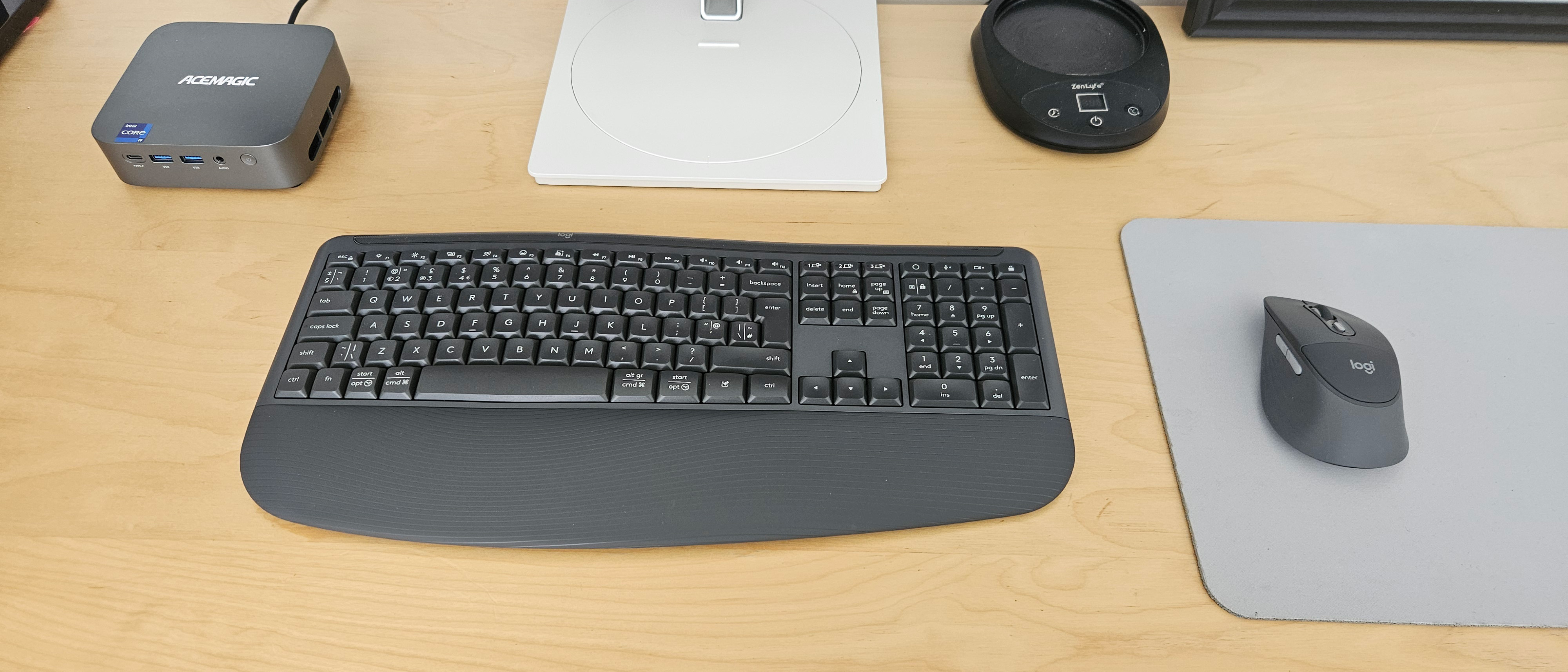 The Logitech Signature Comfort Plus Combo MK880 on a desk