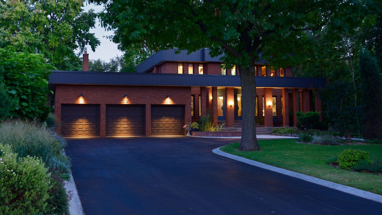 Lit up house and driveway