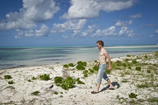 I know I left my shirt around here: Tyler Farrar on the beach