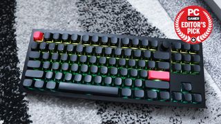 The Keychron Q3 Max gaming keyboard set-up on a desk with the RGB lighting enabled and the PC Gamer Recommends badge in the top right.