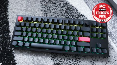 The Keychron Q3 Max gaming keyboard set-up on a desk with the RGB lighting enabled and the PC Gamer Recommends badge in the top right.