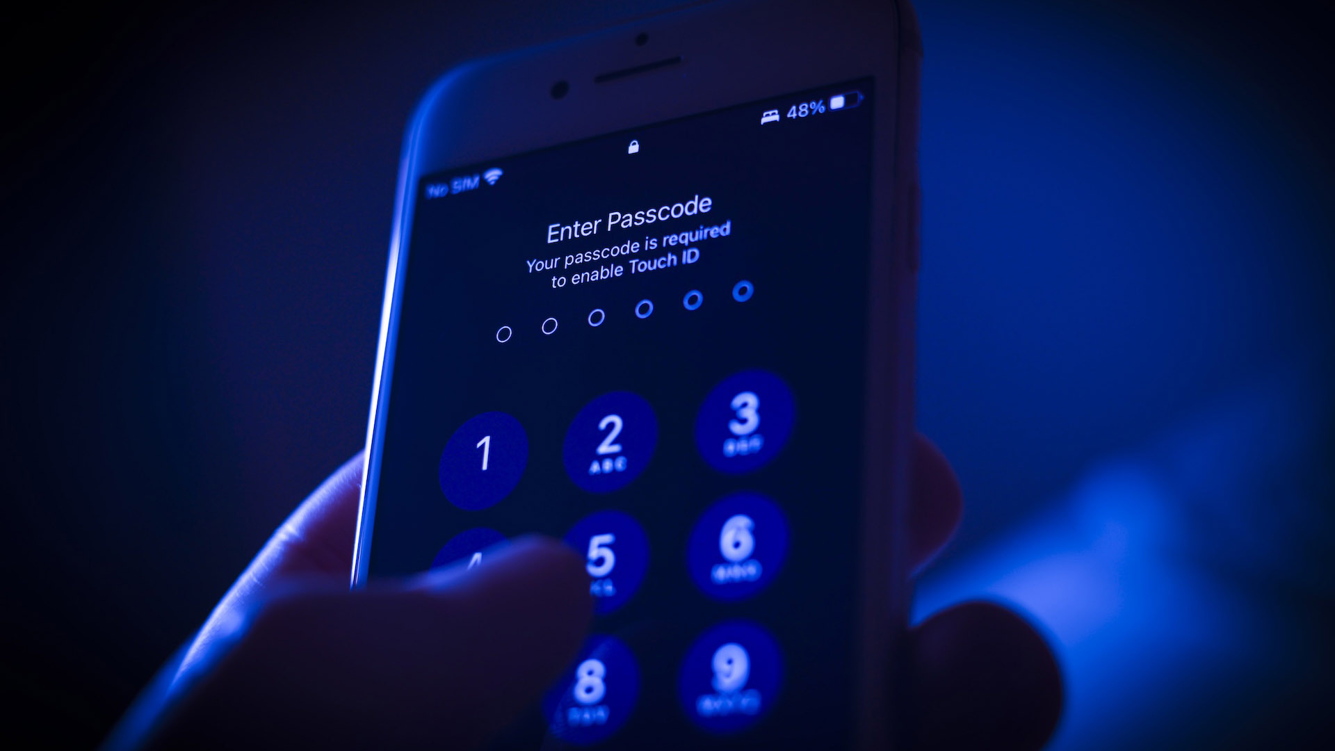 A mobile phone passcode security screen is seen in this photo illustration in Warsaw, Poland on 31 Poland, 2022. Digital rights groups are urging the federal government to rule out requiring identification documents as part of a proposed online age-verification system. Rights groups are warning it could create a honeypot of people&amp;rsquo;s personal information and pornography-viewing habits. (Photo by STR/NurPhoto)