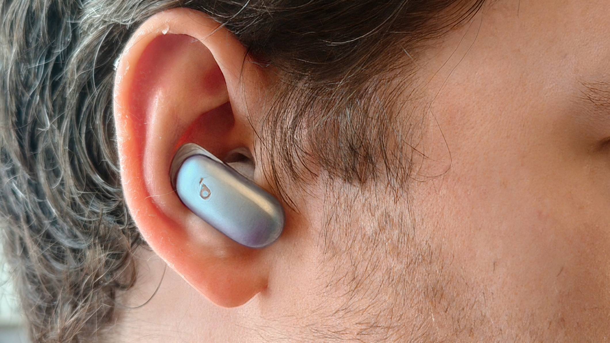 The Anker Soundcore Liberty 5 Pro in a man's ear.