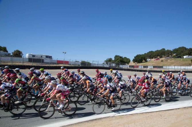 The pro men's field rolls out for their 90-minute circuit race on the 2.3-mile Laguna Seca Raceway.