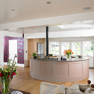 kitchen design with breakfast bar and wooden flooring