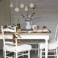 christmas dining room with faux fur seat covers