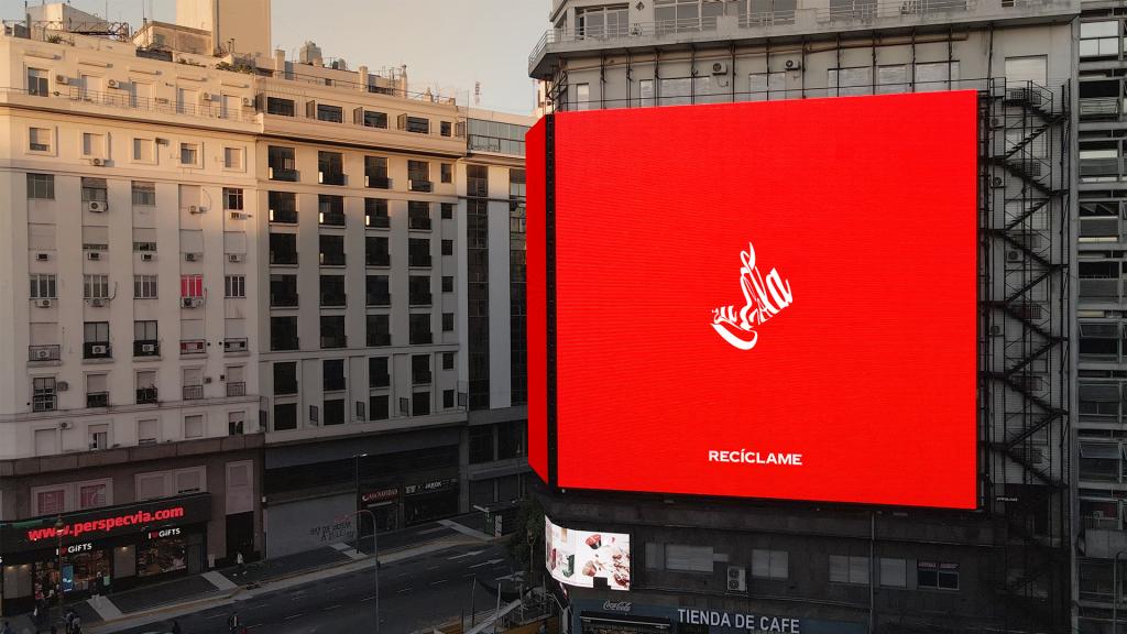 An image of a distorted version of the Coca-Cola logo on a billboard poster