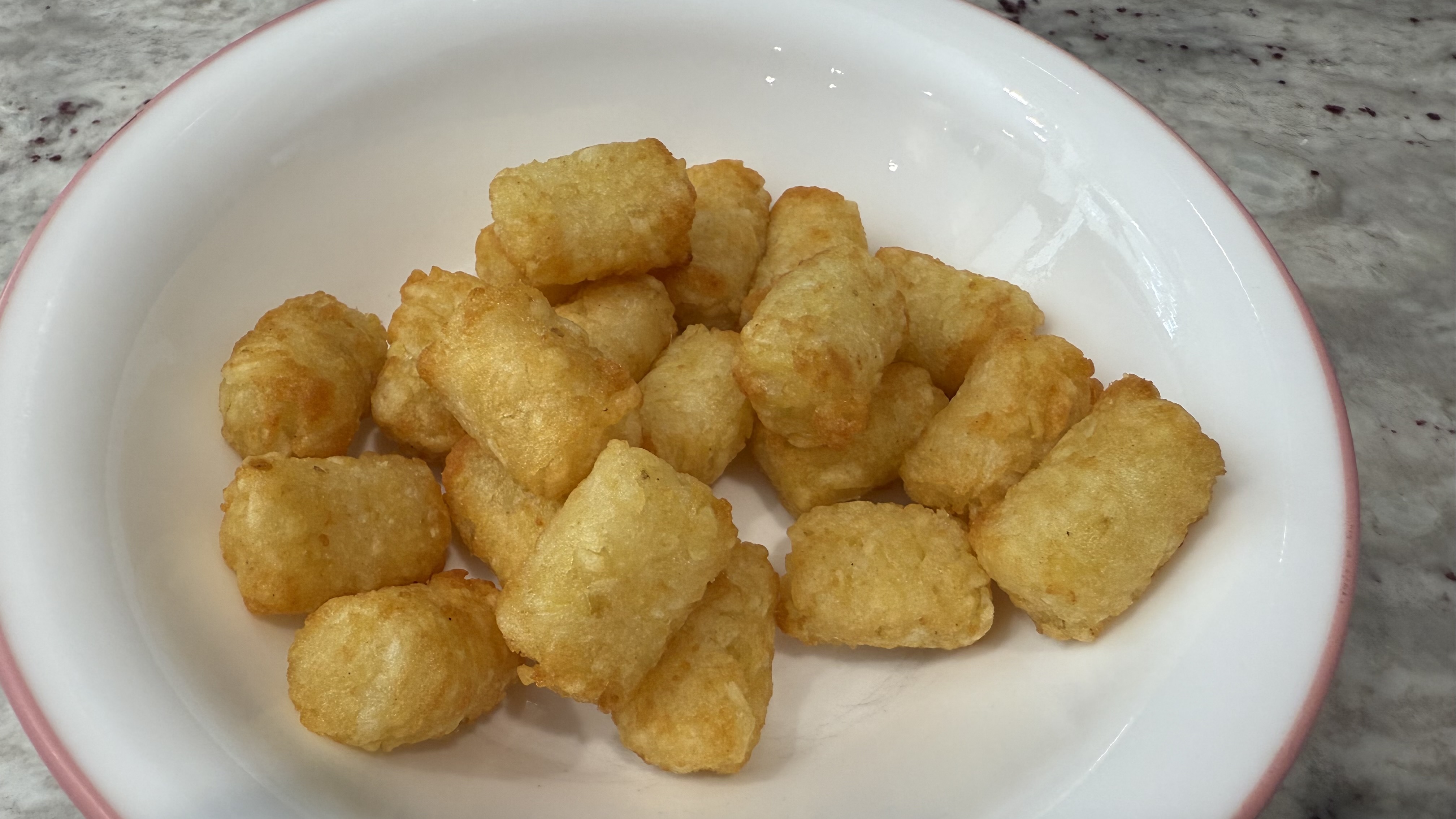 Variety of foods made while testing the Kalorik Vivid Touch air fryer