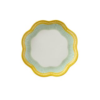 Scalloped dinner plate with green and yellow trim
