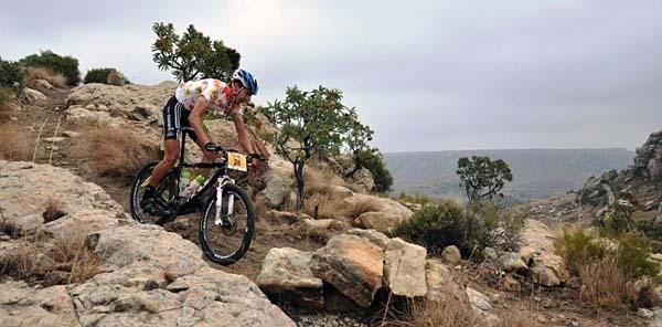Philip Buys leads over the major climb of the day.