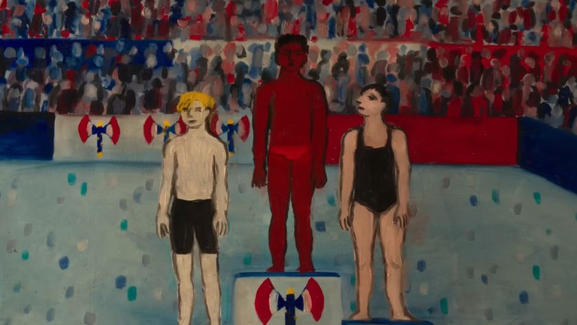 Swimmers standing on a podium in Papillon