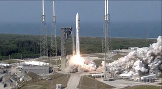 A United Launch Alliance Atlas V rocket carrying the AEHF-6 military communications satellite launches from Florida's Cape Canaveral Air Force Station on March 26, 2020.