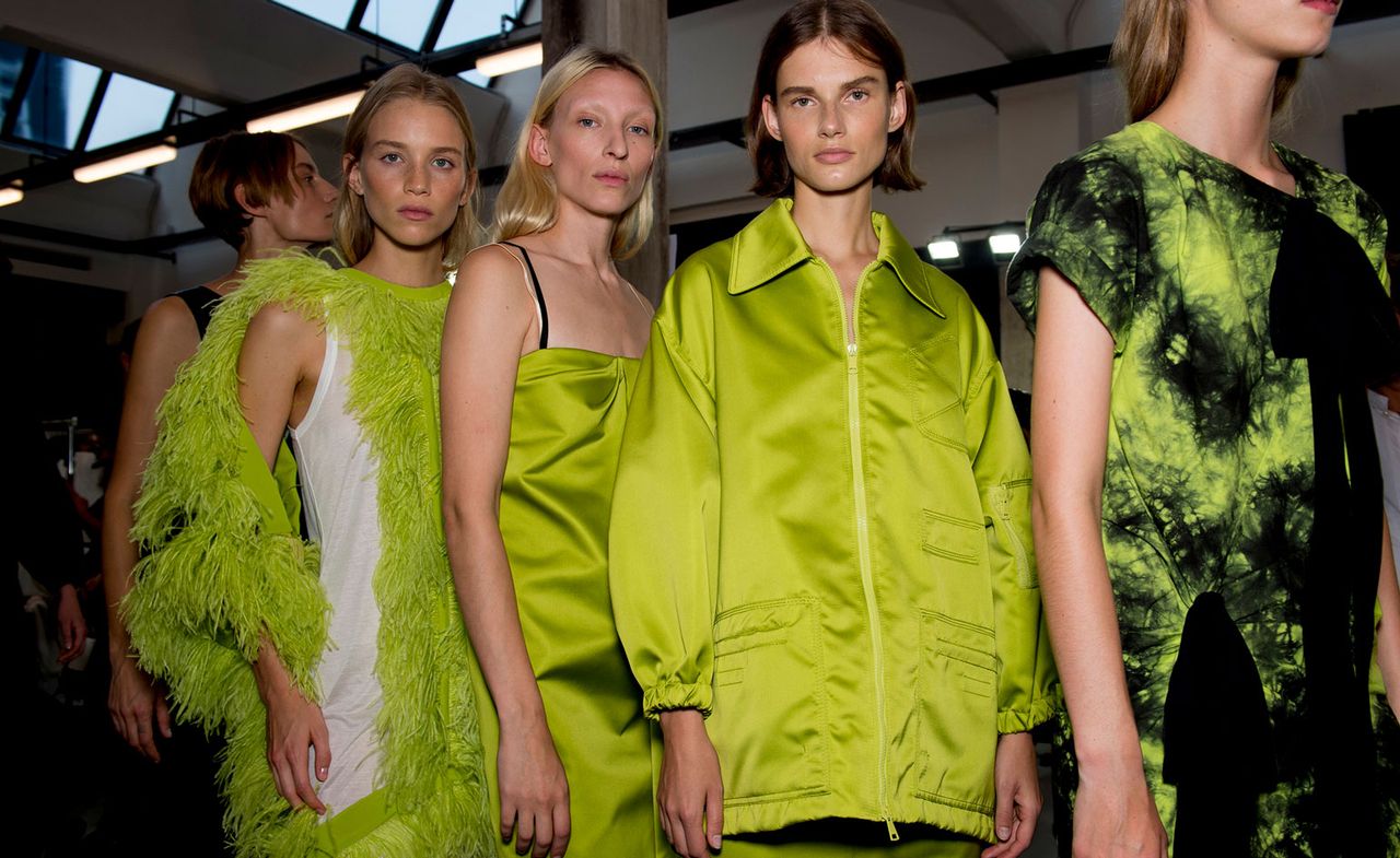 Model wear green dresses and coat