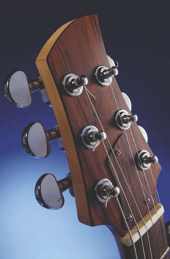 The minimalist headstock is just big enough to fit the tuners on