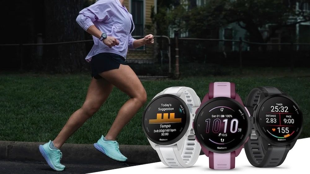 Garmin&#039;s hero image on its press release for the Forerunner 165, showing a woman running while wearing the watch, plus three renders of the Forerunner 165 in the bottom-right corner showing a daily workout suggestion, the main watch face, and the data fields showing during a running activity. 