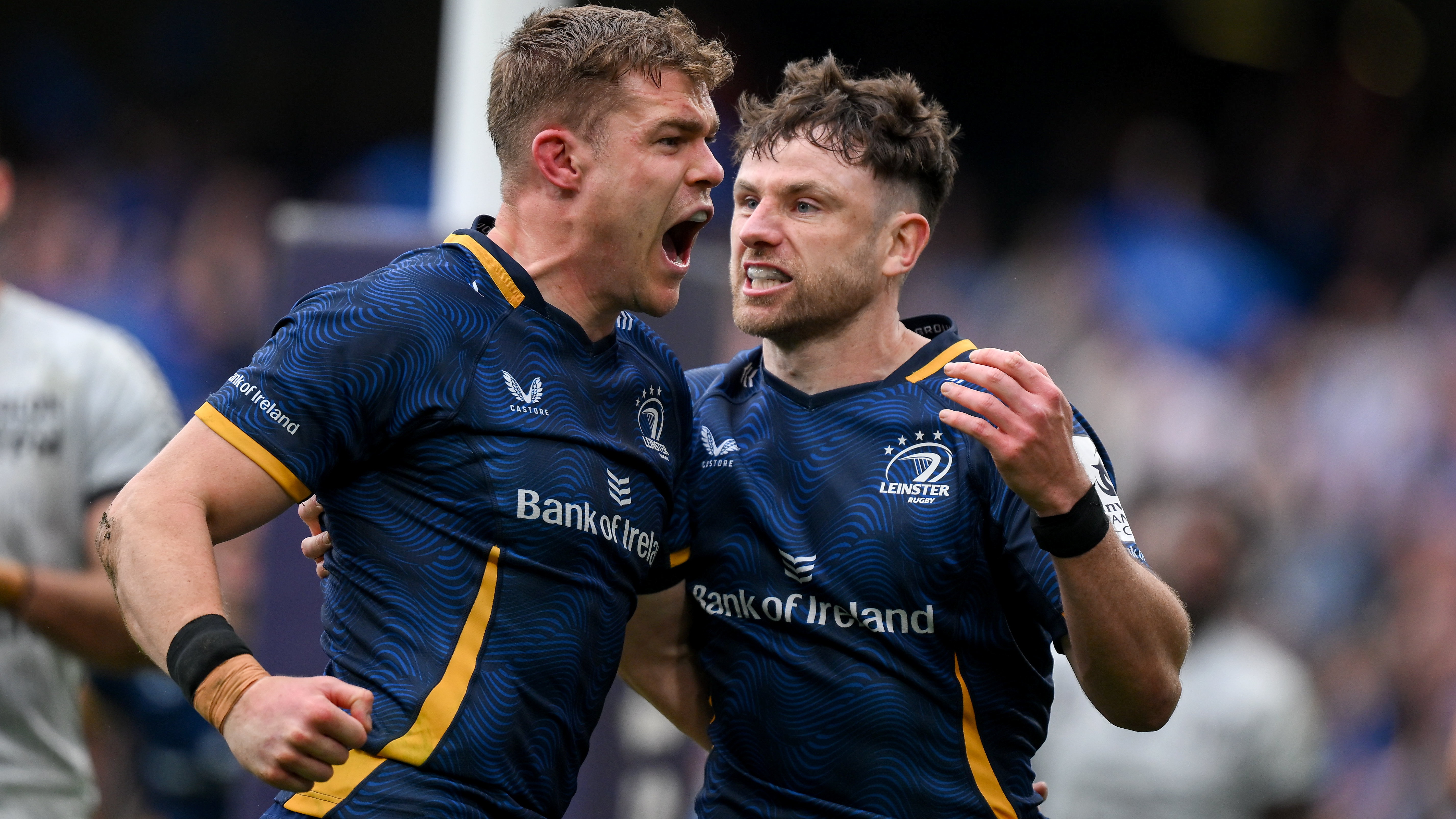 Garry Ringrose of Leinster, left, celebrates with teammate Hugo Keenan after scoring their side's third try during the Investec Champions Cup semi-final match