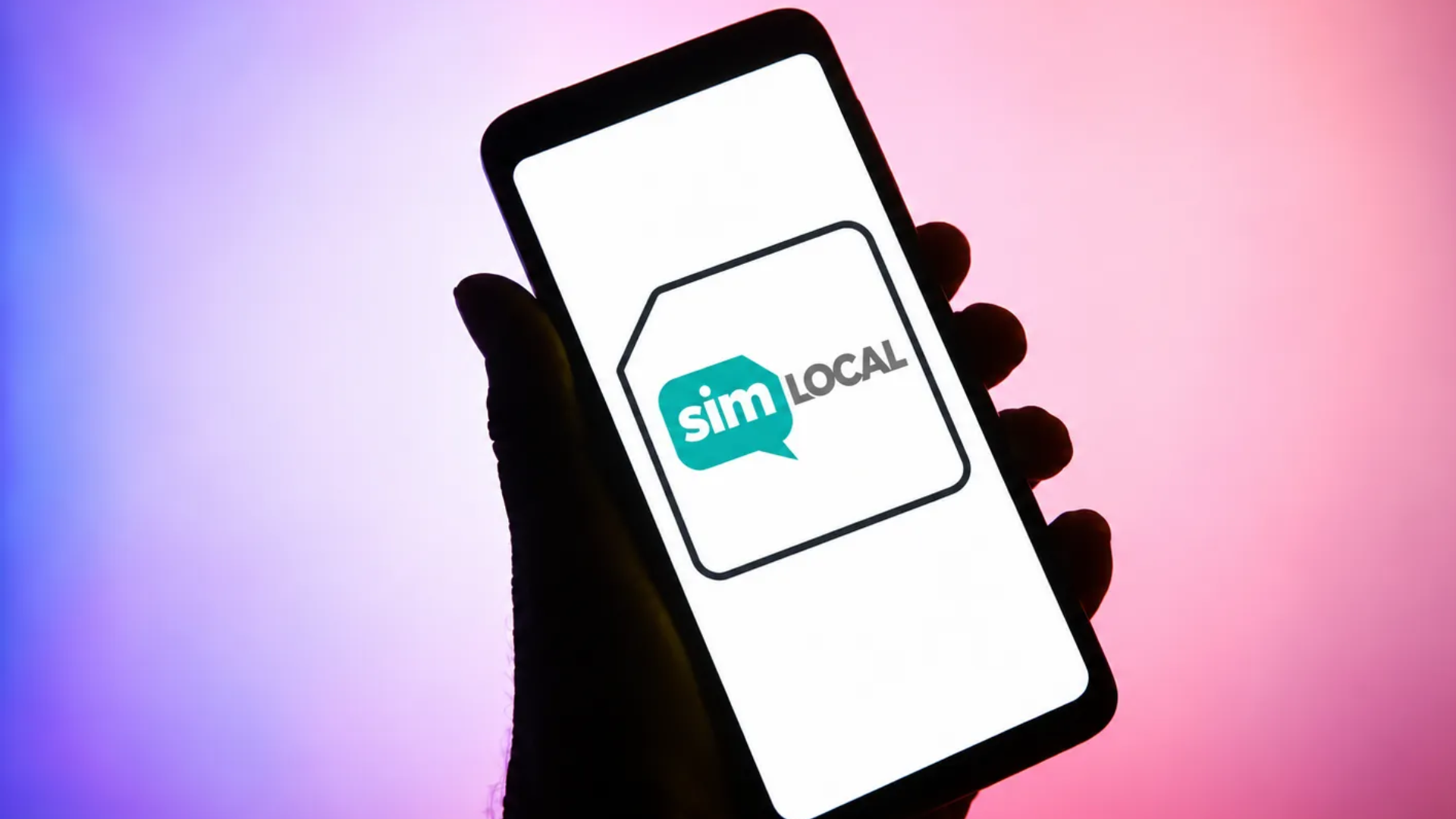 The Sim Local logo on a phone screen held by a silhouette hand