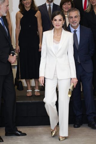 Queen Letizia's all-white pantsuit and metallic accessories stole the show