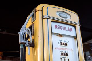 An old yellow gasoline pump