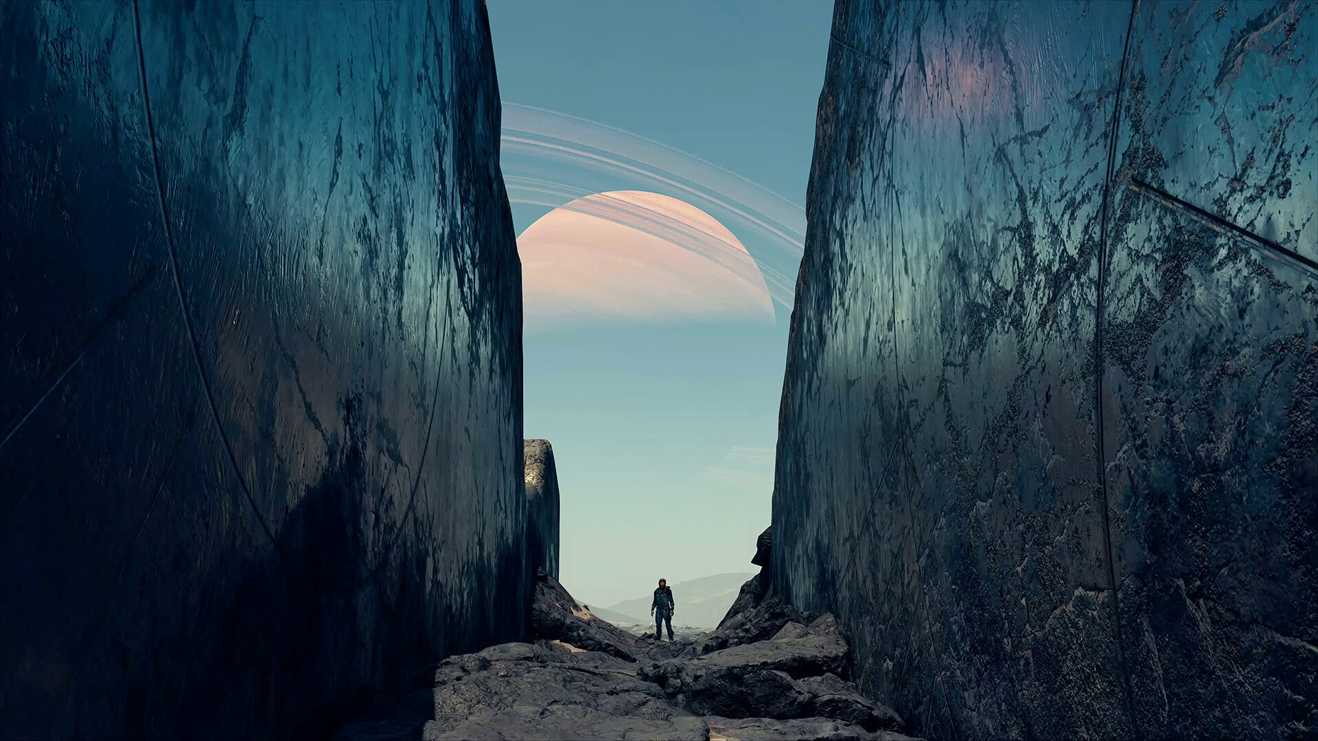 A lone space explorer stands at the bottom of a vast canyon as the sun rises in the background