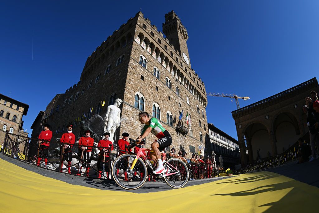 FIRENZE ITALY JUNE 27 Alberto Bettiol of Italy and Team EF Education EasyPost with the Michelangelos David statue in the background during the 111th Tour de France 2024 Team Presentation UCIWT on June 27 2024 in Firenze Italy Photo by Dario BelingheriGetty Images