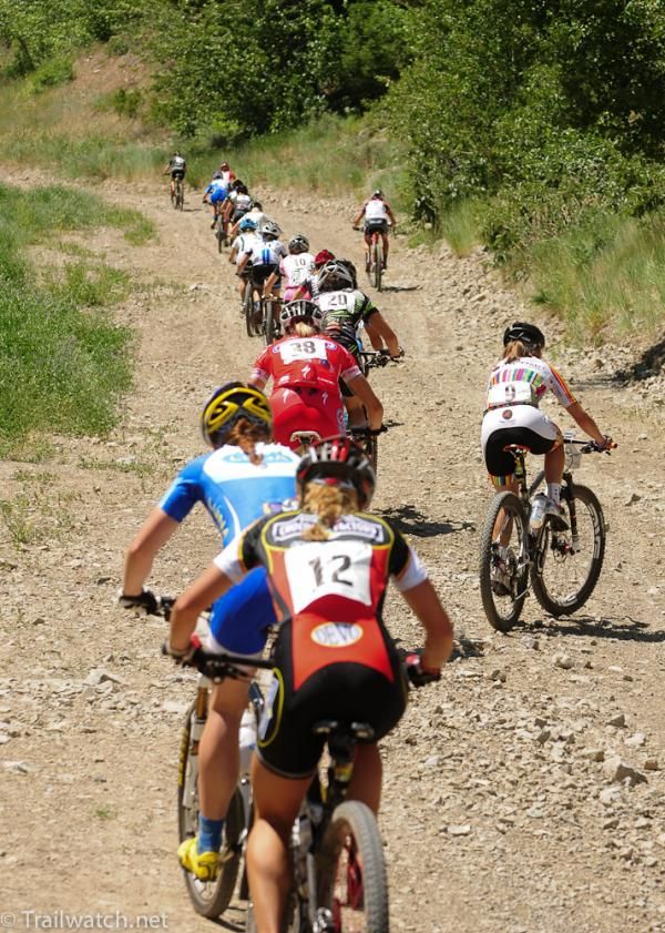 A long train of women attempt to match Heather Irmiger's pace