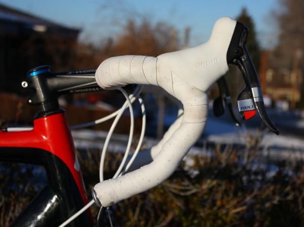 SRAM Red DoubleTap levers are set high on the anatomic bars.