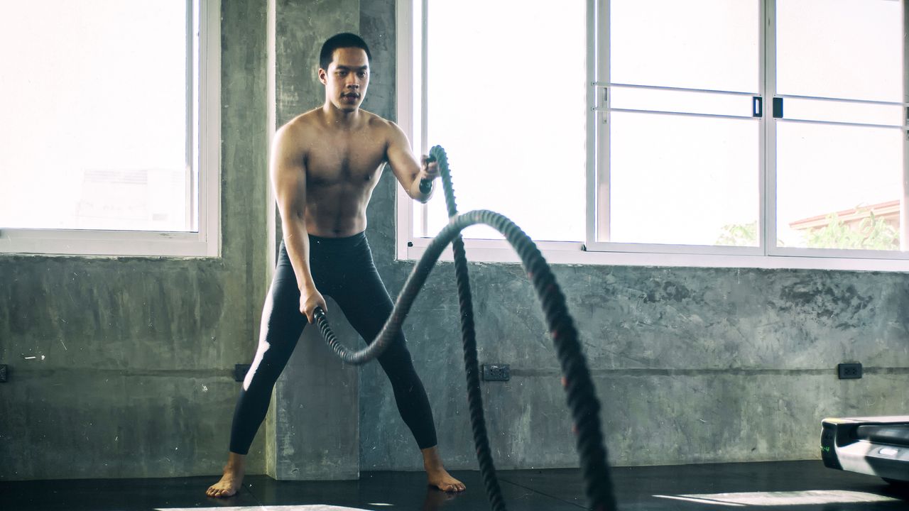 HIIT workout with battling ropes