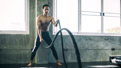 HIIT workout with battling ropes