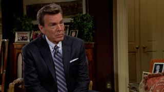 Peter Bergman in a suit at the Abbott mansion in The Young and the Restless