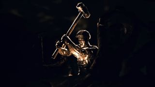 Civilization 7 reveal trailer screenshot showing a man wearing mining gear while wielding a massive hammer above his head, his expression pained