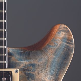 A detail photo of a Fame Forum IV Modern 20th Anniversary in Burl Stonewashed Blue