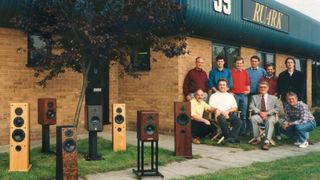 Ruark Audio speakers and team in front of the factory