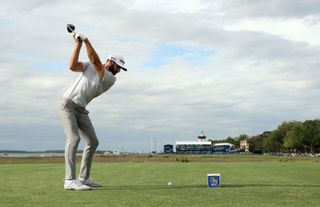 Dustin Johnson tees off on the famous 18th hole at Harbour Town Golf Links