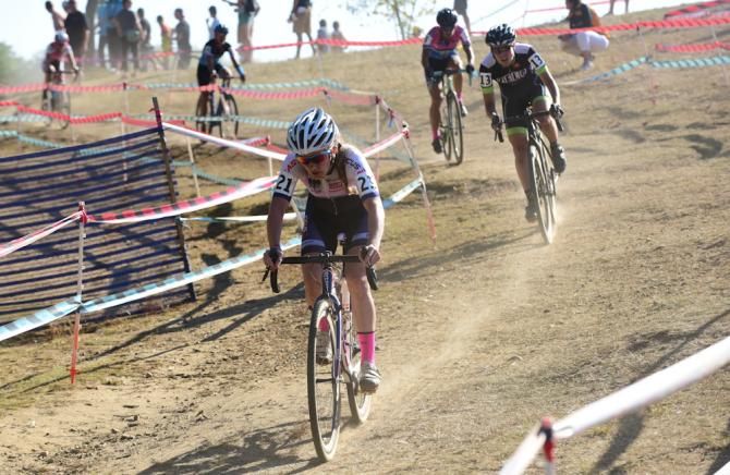Ellen Noble (JAM Fund) riding in third place with a half lap to go