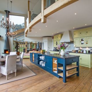 kitchen with wooden flooring and dining table and chair