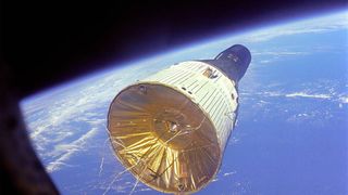 Gemini 6A in space with Earth below.