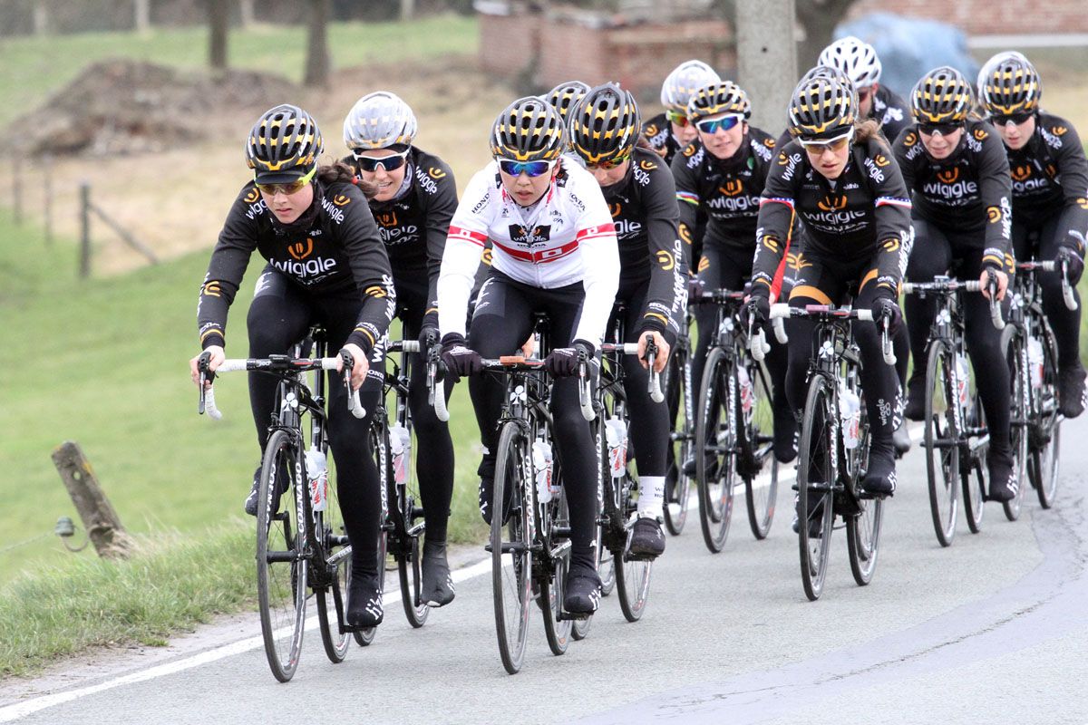 Audrey Courdon and Mayuko Hagiwara ride side by side