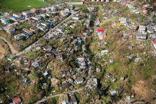 An aerial view of Roseau, the capital of the Caribbean island of Dominica, shows the destruction on Sept. 21.