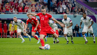 Gareth Bale playing for Wales in a World Cup 2022 match against USA