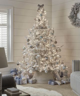 White Christmas Tree in a white living roomliving