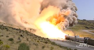 Side view of ATK's Sept. 8, 2011 test firing of the DM3 solid rocket motor, a five-segment booster.