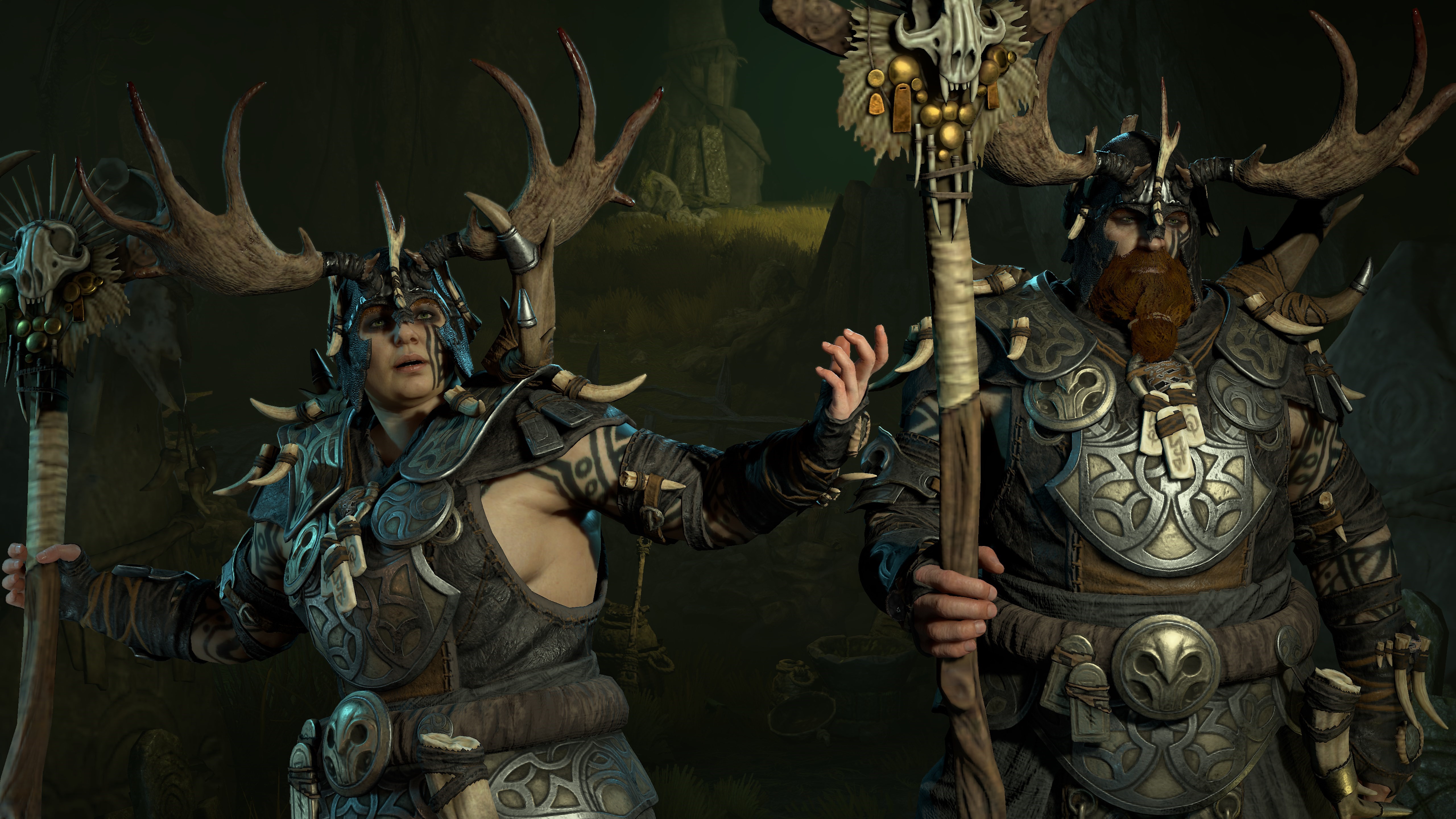 Two druids standing next to each other wearing matching armor. They Both have helmets with antlers on
