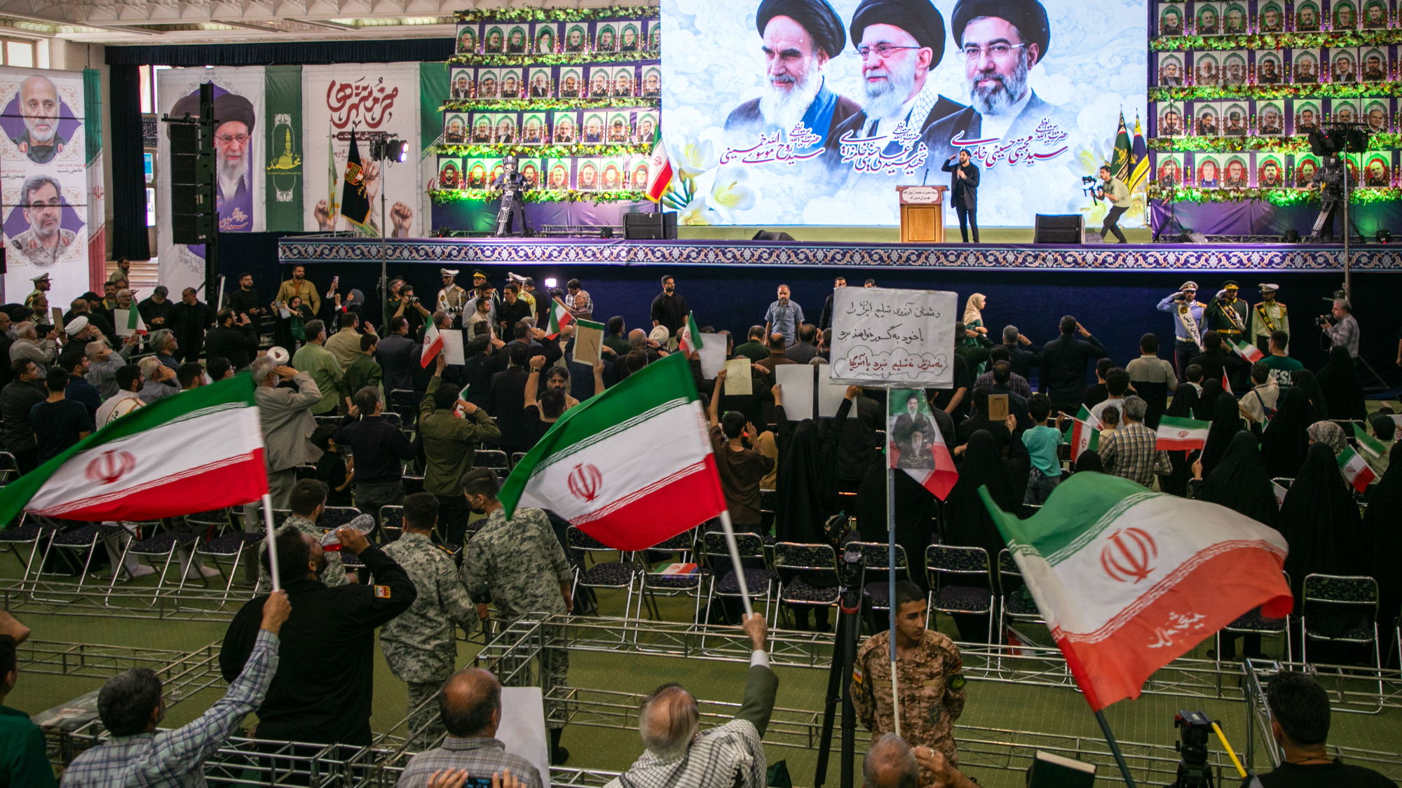 Iranians gather at the Imam Khomeini Mosalla Mosque to commemorate those killed in the US-Israeli wars