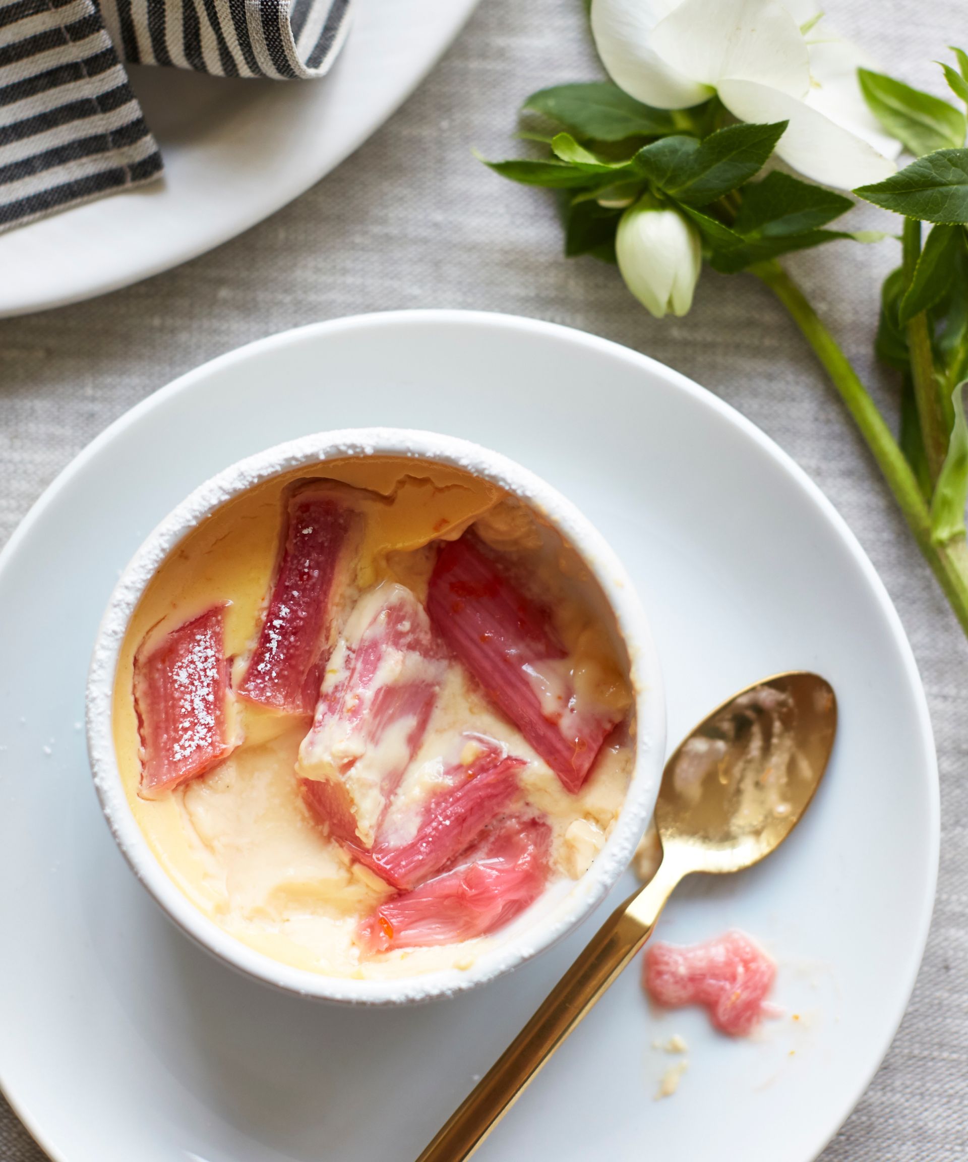 Half enjoyed custard pudding easter dish in a white bowl