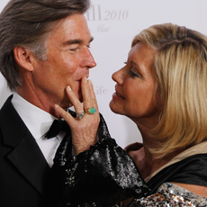 Olivia Newton-John and her husband John Easterling attend the Dreamball 2010 charity gala at the Grand Hyatt hotel on September 23, 2010 in Berlin, Germany.