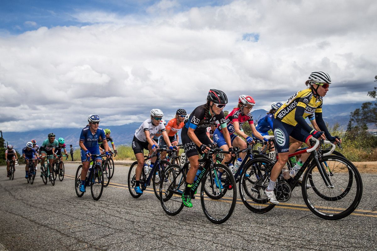 Amber Neben, in yellow, pushes the pace