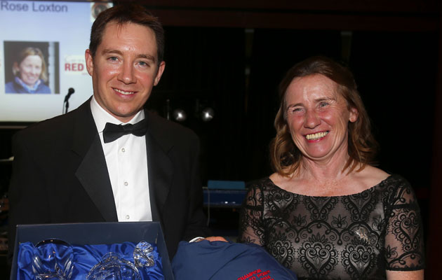 Gareth Connolly presents Rose Loxton with The Connelly's Red Mills Trainers'Championship for yards with seven or fewer horses Point to Point Awards - Cheltenham 15.11.14 Pic Dan Abraham-racingfotos.com
